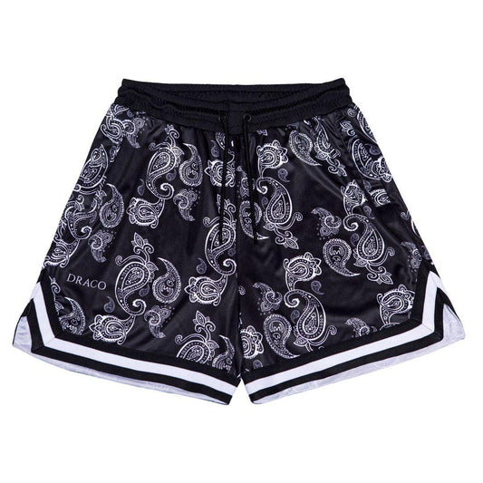 A pair of black and white bandanna patterned Draco bandanna shorts with a visible drawstring and white trim at the hem.