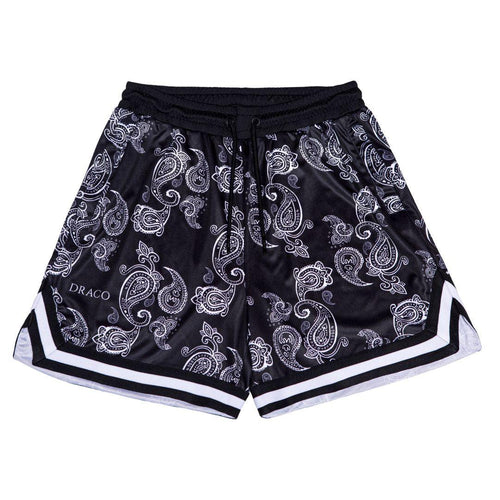 A pair of black and white bandanna patterned Draco bandanna shorts with a visible drawstring and white trim at the hem.